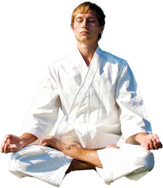 Martial Arts Lessons for Adults in Lanham MD - Young Man Thinking and Meditating in White