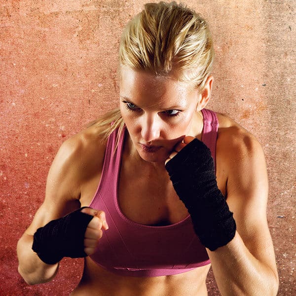 Mixed Martial Arts Lessons for Adults in Lanham MD - Lady Kickboxing Focused Background